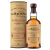 14 letnia Whisky Balvenie Caribbean Cask dojrzewająca w beczkach po bourbonie i finiszowana w beczce po rumie o mocy 43% abv. Dostępna w zestawie z elegancką puszką. 